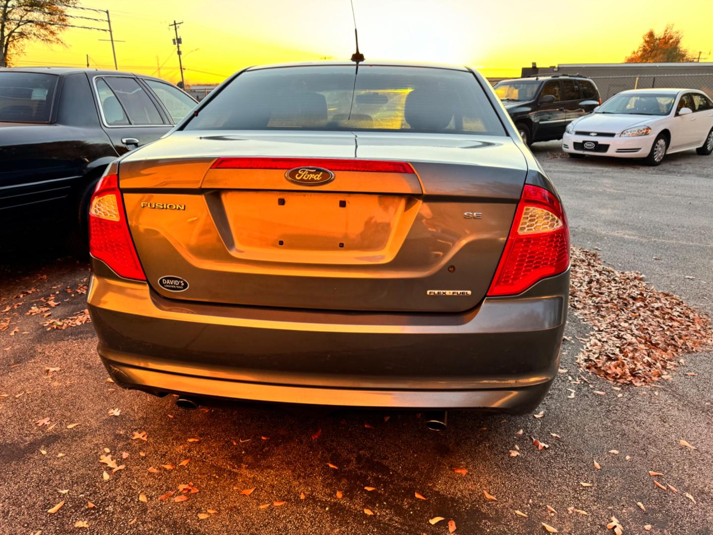 2011 BLUE Ford Fusion V6 SE (3FAHP0HGXBR) with an 3.0L V6 DOHC 24V engine, located at 307 West Marshall Avenue, Longview, TX, 75601, (903) 753-3091, 32.500828, -94.742577 - Photo#4